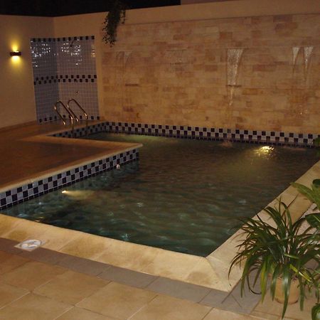 Olimpo Hotel & Suites Itaugua Exterior photo